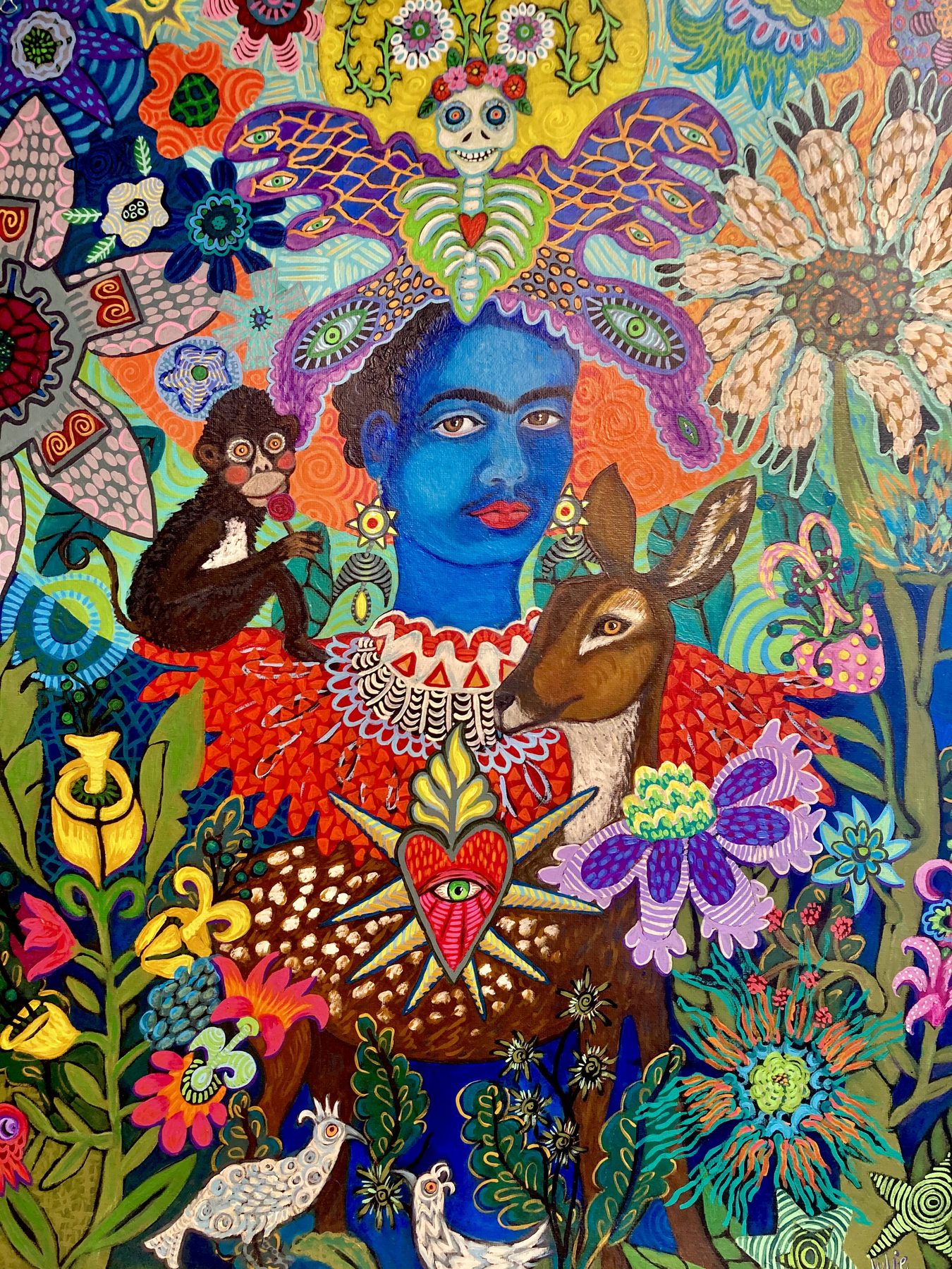 Folk art figures with flowers and birds