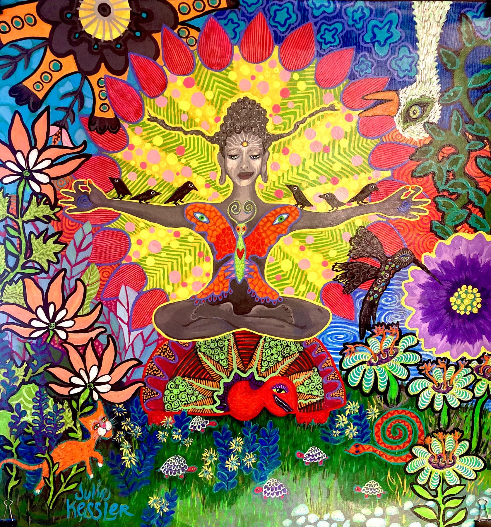 Folk art figure in lotus pose surrounded by flowers