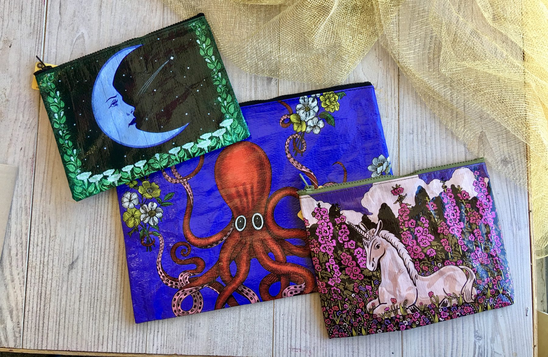 Three small folk art panels with sea creatures