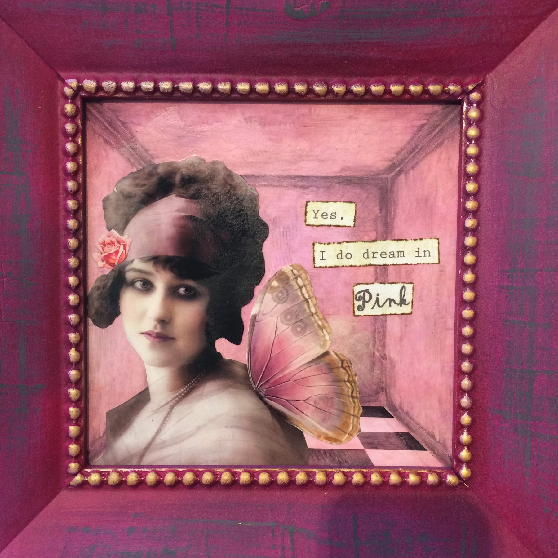 Vintage portrait with butterfly in a magenta shadow box