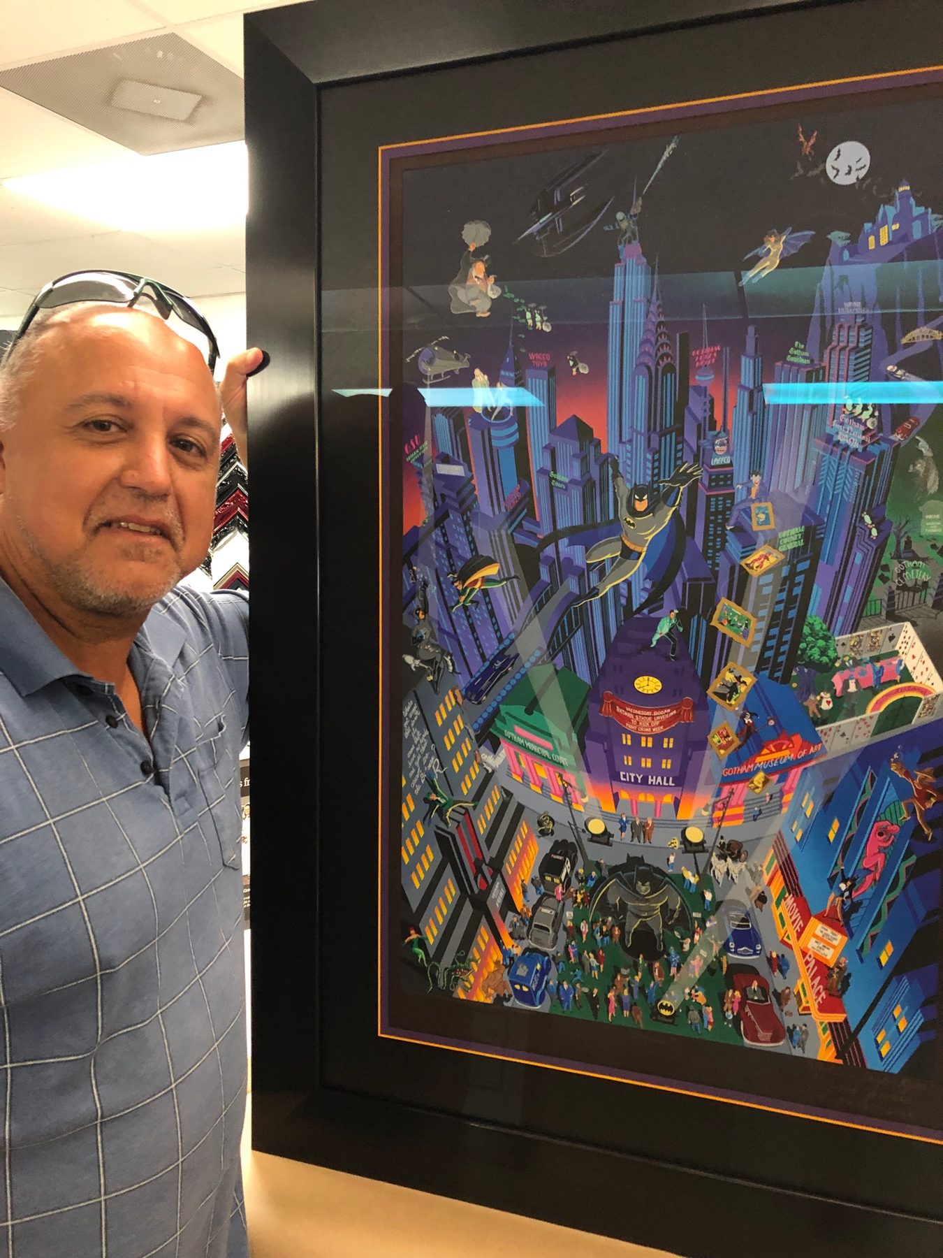 Colorful framed cityscape with a customer