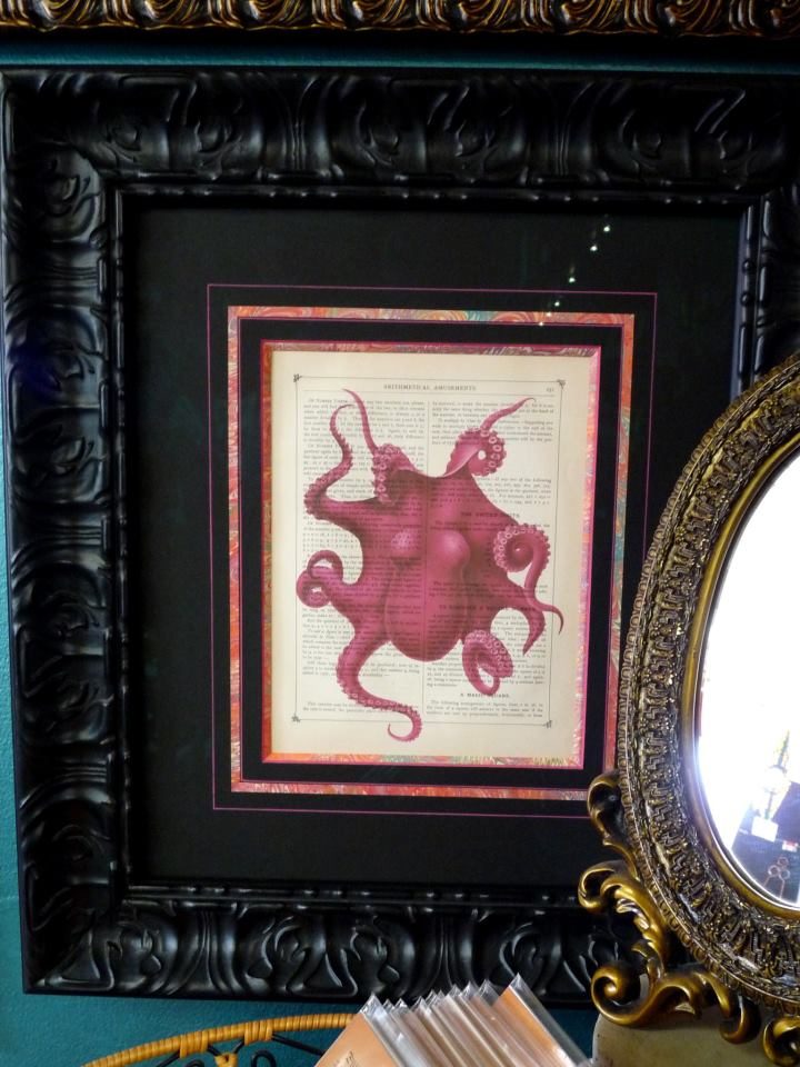 Octopus print in an ornate black frame