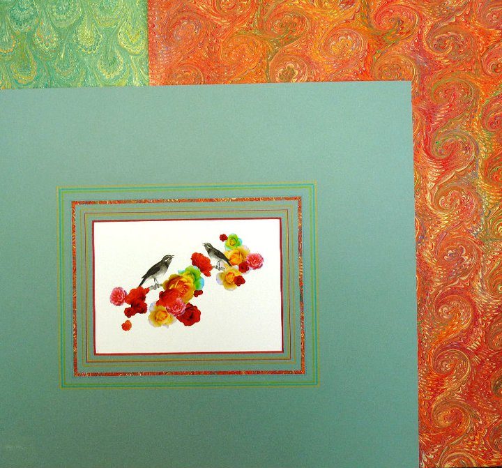 Floral artwork on a teal mat with decorative inner border